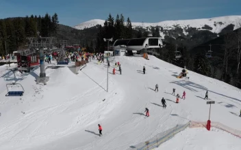 Stock Video Landscape Of Sky Lifts And Skiers In The Hill Animated Wallpaper