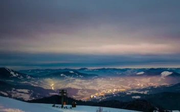 Stock Video Landscape Of A Village In The Center Of Snowy Mountains Animated Wallpaper