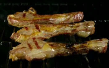Stock Video Lamb Ribs Cooking On A Grill Animated Wallpaper
