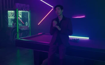 Stock Video Man In Ornate Suit At The Edge Of A Pool Animated Wallpaper