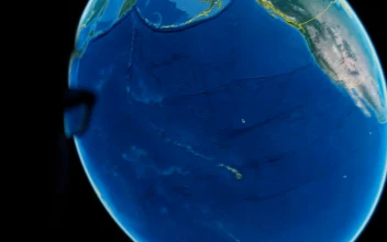 Stock Video Man In Front Of A Computer While Using Google Earth Animated Wallpaper