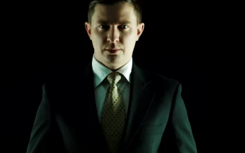 Stock Video Man In A Suit Put Money On His Mouth Animated Wallpaper