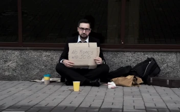 Stock Video Man In A Suit Begging On The Street Animated Wallpaper