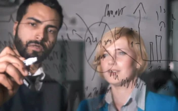 Stock Video Man Illustrates Idea On Glass Wall To Coworker Animated Wallpaper