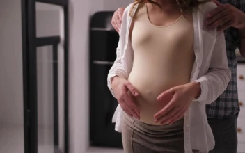 Stock Video Man Hugging His Pregnant Wife From Behind Animated Wallpaper