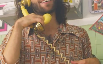 Stock Video Man Having A Phone Call At Home Animated Wallpaper