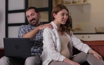 Stock Video Man Giving A Massage To His Pregnant Wife Animated Wallpaper