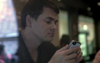 Stock Video Man Getting Bad News By Text Animated Wallpaper