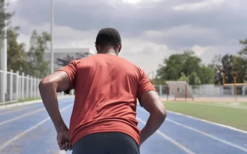 Stock Video Man From Behind Running In A Sports Center Animated Wallpaper