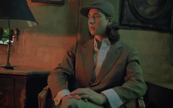 Stock Video Man From A Bygone Era Sitting On A Sofa Animated Wallpaper