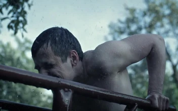 Stock Video Man Exercising Outdoors While Raining Animated Wallpaper