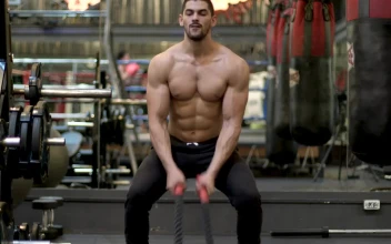 Stock Video Man Exercising Hard With A Pair Of Ropes Animated Wallpaper