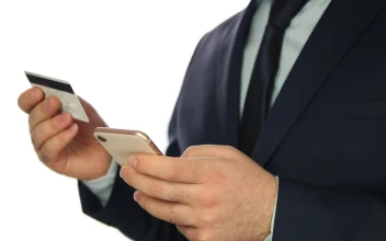 Stock Video Man Entering Bank Data In A Cellphone Animated Wallpaper