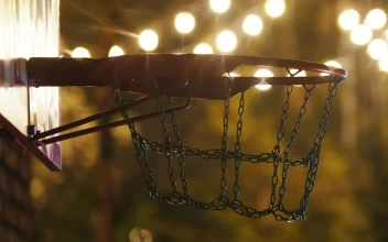 Stock Video Man Dunking The Ball In A Basketball Hoop At Night Animated Wallpaper