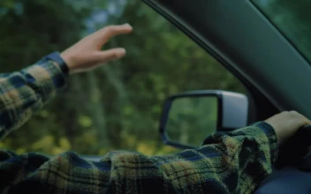 Stock Video Man Driving Through Nature Enjoying The Wind Animated Wallpaper