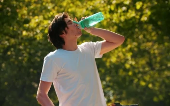 Stock Video Man Drinking Water From A Bottle And Riding His Bike Animated Wallpaper