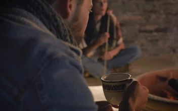 Stock Video Man Drinking Homemade Coffee On A Campfire Night Animated Wallpaper