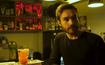 Stock Video Man Drinking A Prepared Red Drink In A Bar Animated Wallpaper
