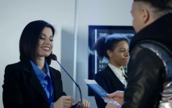 Stock Video Man Doing The Check In For The Flight Animated Wallpaper