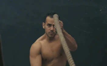 Stock Video Man Doing Rope Exercise Animated Wallpaper