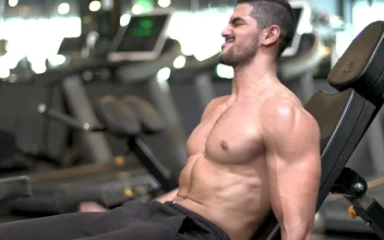 Stock Video Man Doing Reps With A Pair Of Dumbbells Animated Wallpaper