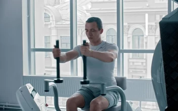 Stock Video Man Doing Chest Exercise At A White Gym Animated Wallpaper