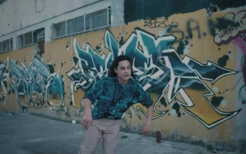 Stock Video Man Dancing On The Street Of A Neighborhood Animated Wallpaper
