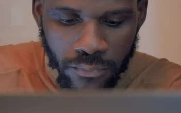Stock Video Man Closes His Laptop After Work Animated Wallpaper