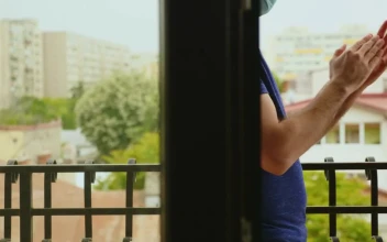 Stock Video Man Clapping While Wearing A Mask Animated Wallpaper