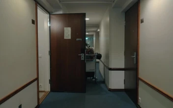 Stock Video Man Checking Out Of A Hotel Room Animated Wallpaper