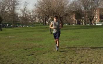 Stock Video Man Checking His Phone While Jogging Animated Wallpaper