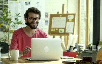 Stock Video Man Celebrating In Front Of The Computer Animated Wallpaper