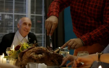 Stock Video Man Carving Turkey On Thanksgiving Dinner Animated Wallpaper