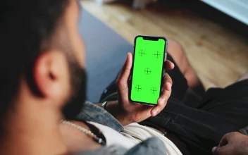 Stock Video Man Browsing Website On Mobile Greenscreen Animated Wallpaper