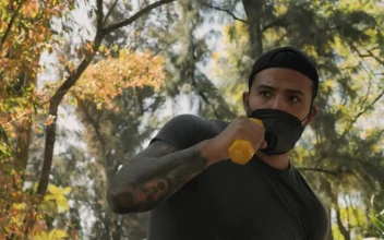 Stock Video Man At Boxing Training With Dumbbells Animated Wallpaper