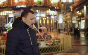 Stock Video Man At A Fair Coughing Loudly Animated Wallpaper