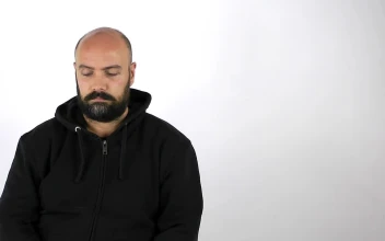 Stock Video Man Answers A Call On A White Background Animated Wallpaper
