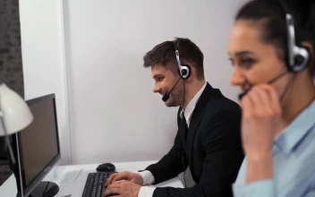 Stock Video Man And Woman Working In A Call Center Animated Wallpaper
