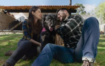 Stock Video Man And Woman Petting Their Dog In A Garden Animated Wallpaper