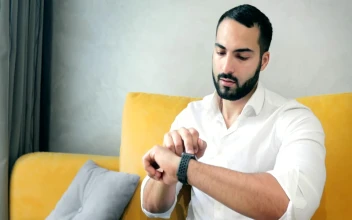 Stock Video Man Activates Futuristic Hologram Browser With Smart Watch Animated Wallpaper