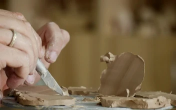Stock Video Male Hands Working On Clay With Cutting Tools Animated Wallpaper