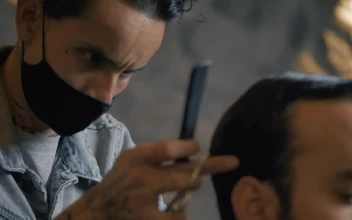 Stock Video Male Hairstylist Cutting A Clients Hair Animated Wallpaper
