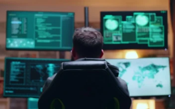 Stock Video Male Hacker Sitting At His Desk Animated Wallpaper