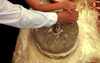 Stock Video Making Wheat Flour In A Rotating Stone Animated Wallpaper