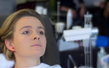 Stock Video Making Up A Womans Face In A Salon Animated Wallpaper