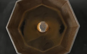 Stock Video Making Coffee In A Moka Pot Animated Wallpaper