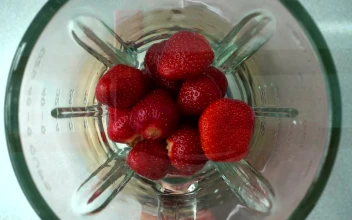 Stock Video Making A Strawberry Smoothie Animated Wallpaper
