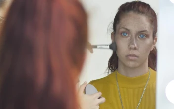 Stock Video Makeup Artist Preparing A Girl In Front Of A Mirror Animated Wallpaper