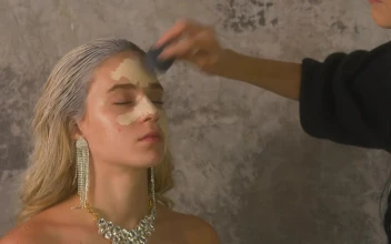 Stock Video Makeup Artist Applying Base To A Models Face Animated Wallpaper
