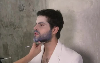 Stock Video Make Up Artist Making Up A Man With Winter Style Animated Wallpaper